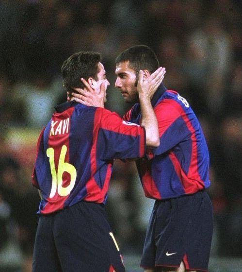 Xavi Hernandez y Pep Guardiola